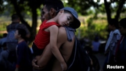 Migrantes centroamericanos en caravana hacia EEUU. 